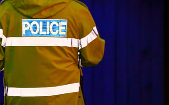A police officer at a alcohol check point.