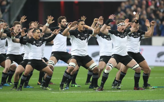 The All Blacks perform the Haka in their new jerseys in the Test against France in Paris.