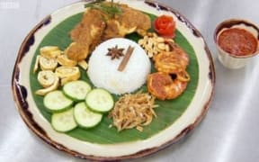 Judges John Torode and Gregg Wallace said Bristol-based Zaleha Kadir Olpin's chicken rendang needed "crispy" skin.