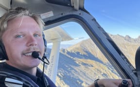Henry Phelps at the helm of a small plane