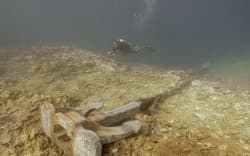 The Manawanui’s anchor is seen on the reef, with its chain causing damage as it sways with the currents.
