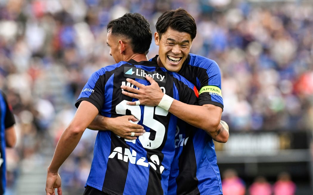 Hiroki Sakai of Auckland FC celebrates a goal by Neyder Moreno of Auckland FC.