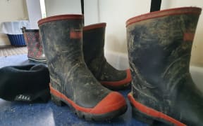 Country kids' gumboots in the cloakroom at Makuri School