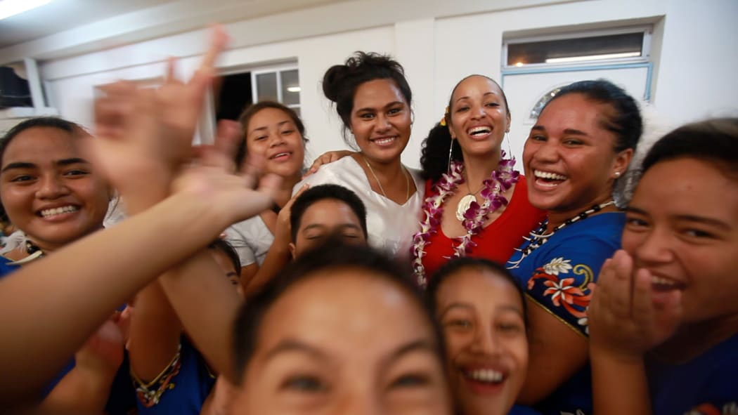 Queen Muhammad Ali with youth of American Samoa