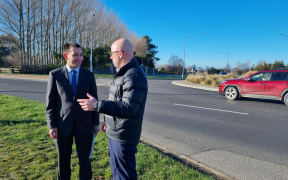 Transport Minister Simeon Brown and Waimakariri MP Matt Doocey at the Pegasus roundabout on 5 July, 2024.