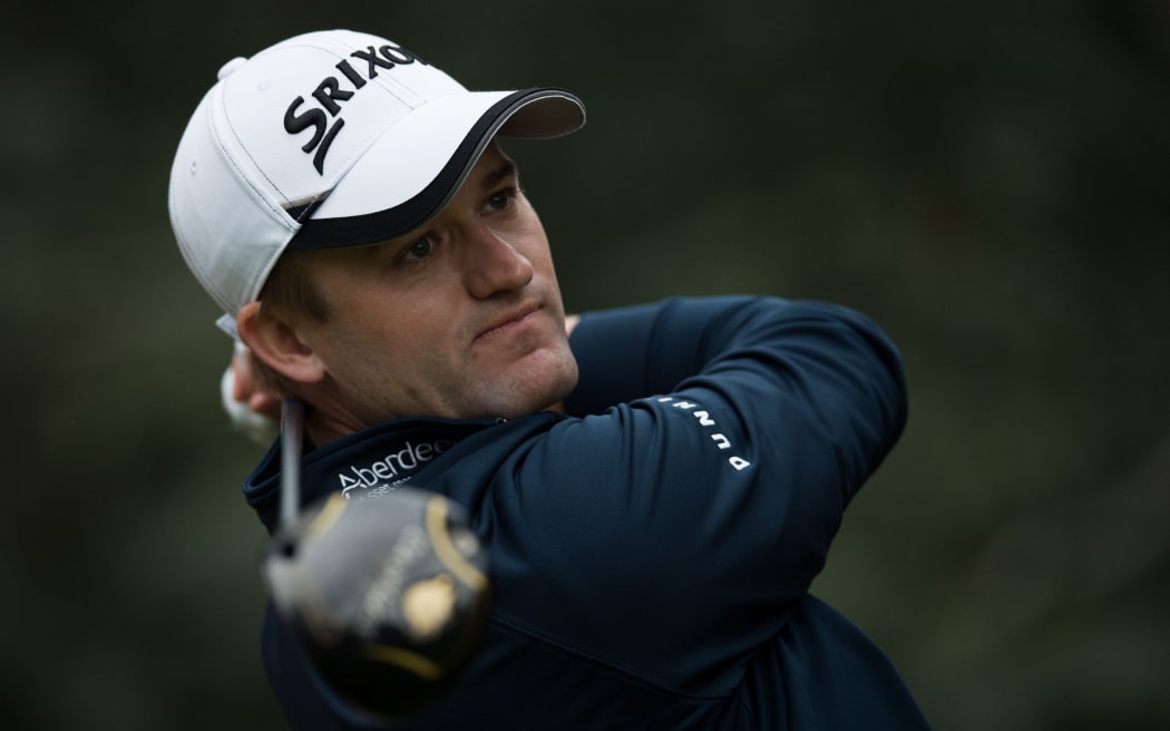 Russell Knox of Scotland tees off during the WGC-HSBC Champions golf tournament in Shanghai on November 8, 2015.