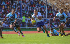 Former Fiji 7s representative Filipo Daugunu in full flight for Queensland Country against the Drua.