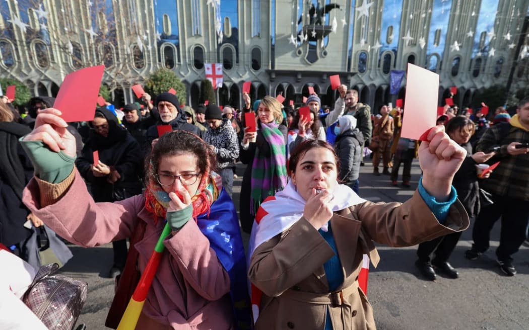 Protesters rally ahead of the inauguration ceremony for Georgian President-elect Mikheil Kavelashvili, in Tblisi. His rise to power has triggered a wave of demonstrations among pro-EU citizens.