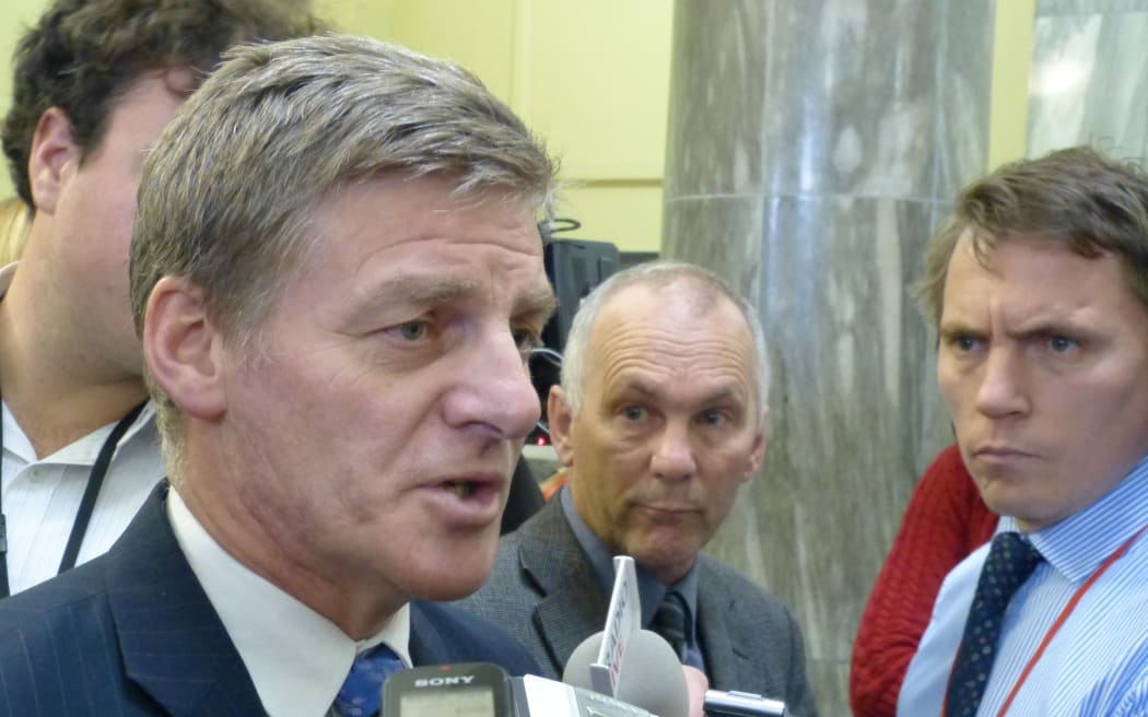 Bill English speaking to reporters on Thursday.