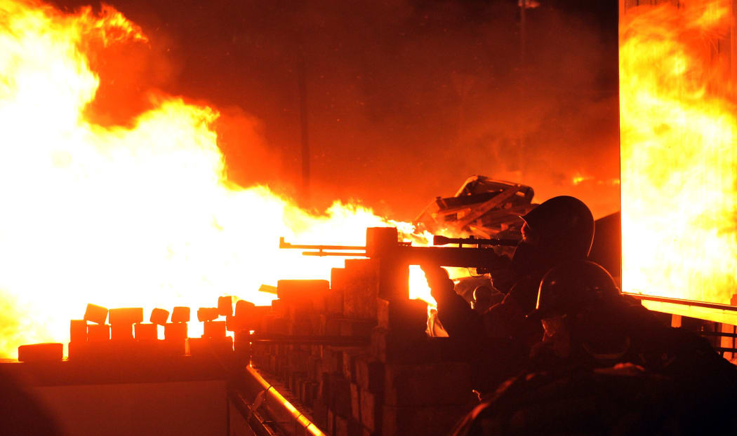 Protesters clash with police in Kiev.