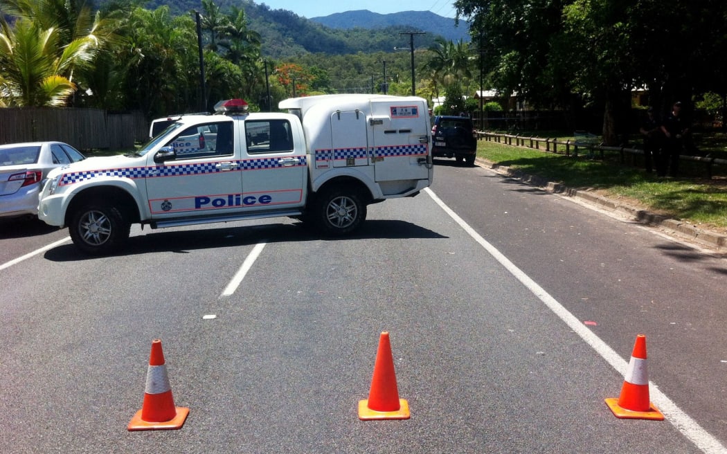 Police have blocked the road to the house.