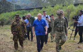 NZ PM Christopher Luxon views a mortar training and live firing exercise with NZDF and Papua New Guinea troops.