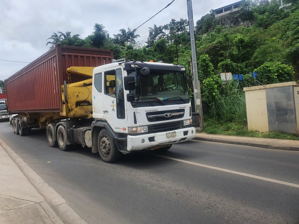 Choppers being carted to Port Vila wharf