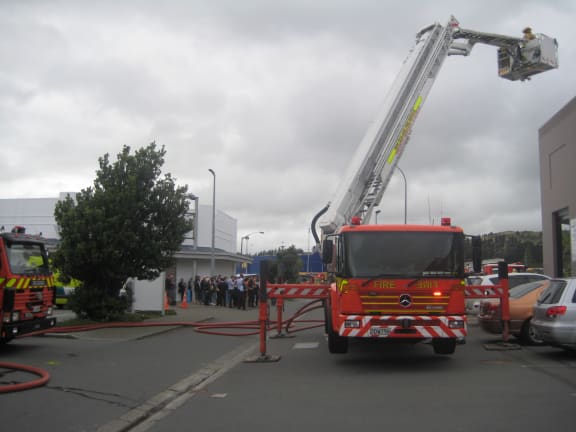 Twelve fire trucks worked to contain the fire.