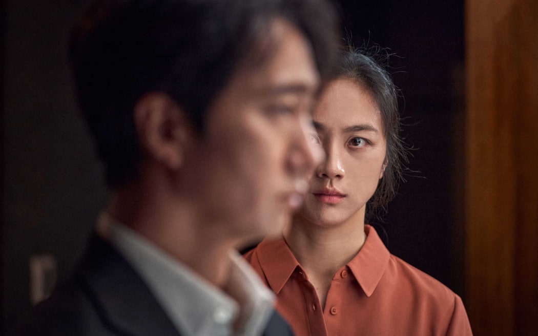 Park Hae-il and Tang Wei in the 2022 Korean film Decision to Leave