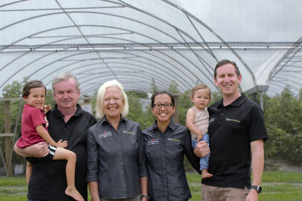 Patrick Malley (far right) with his children and wife Rebecca (second from right), and parents Linzi and Dermott.