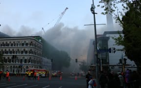 Smoke fills Auckland's CBD, where firefighters are battling a blaze at the SkyCity Convention Centre.
