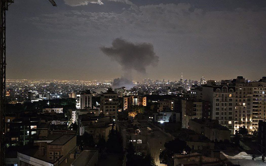 This handout photo released by Iran's Revolutionary Guard Corps (IRGC) official Sepah News Telegram channel on June 13, 2025 shows smoke billowing from a site reportedly targeted by an Israeli strike in the Iranian capital Tehran early in the morning. Israeli Prime Minister Benjamin Netanyahu said in a video statement in the early hours of June 13 that Israel carried out strikes on Iran and the military operation against the Islamic republic would  "continue for as many days as it takes". (Photo by SEPAH NEWS / AFP) / RESTRICTED TO EDITORIAL USE - MANDATORY CREDIT "AFP PHOTO / SEPAH NEWS  " - NO MARKETING NO ADVERTISING CAMPAIGNS - DISTRIBUTED AS A SERVICE TO CLIENTS