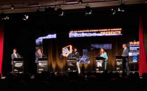David Seymour, Grant Robertson, Nicola Willis and James Shaw - their parties finance spokespeople - take part in the ASB Great Debate in Queenstown on 14 September 2023.