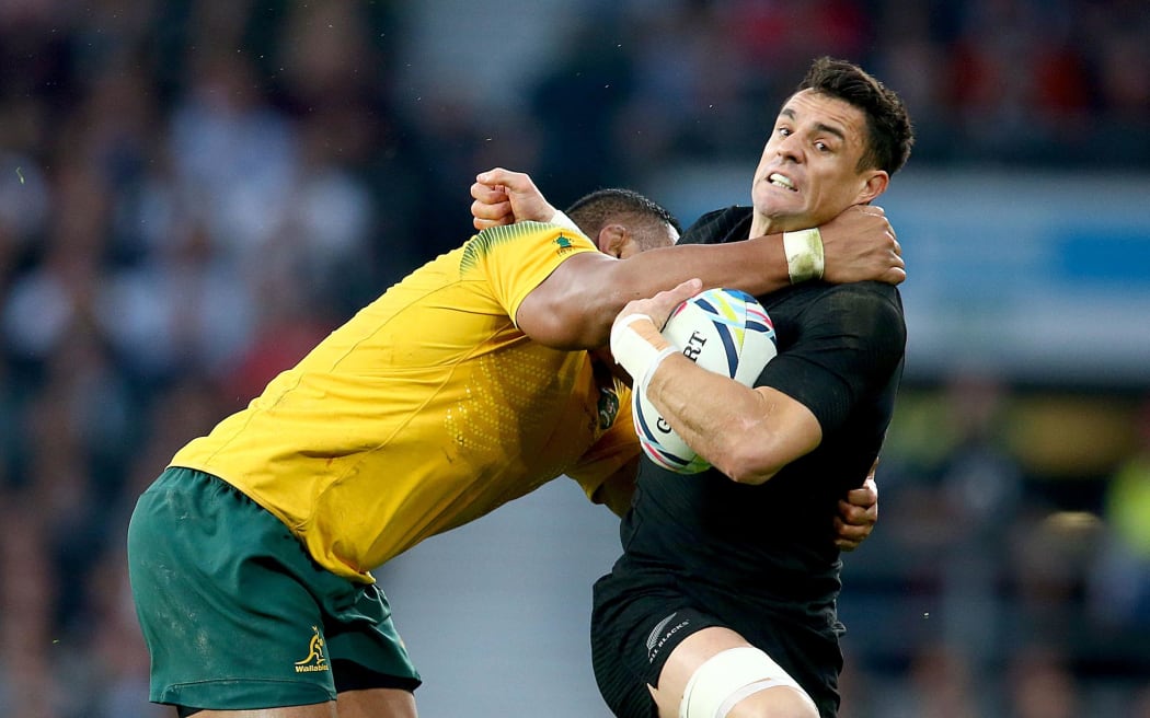 Dan Carter cops a high tackle RWC2015 final.
