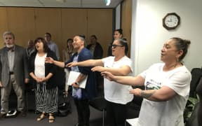 Spontaneous waiata in NRC council chambers in support of the council's decision on Māori constituencies. From left, Mike Kake, Violet Sade, Auriole Ruka, Aorangi Kawiti and Ana Kake.