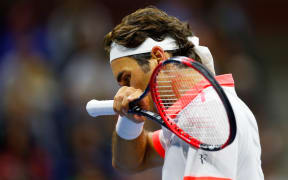 Roger Federer of Switzerland reacts against Novak Djokovic of Serbia during their final at the 2015 US Open at the USTA Billie Jean King National Tennis Center on September 13, 2015 Mike Stobe/Getty Images for the USTA/AFP