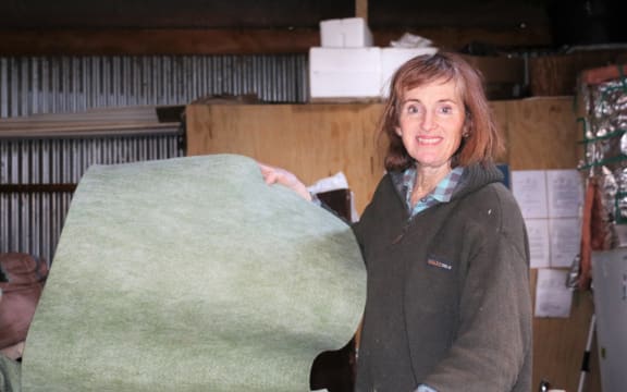 Jane Schwass with a woolen exercise mat