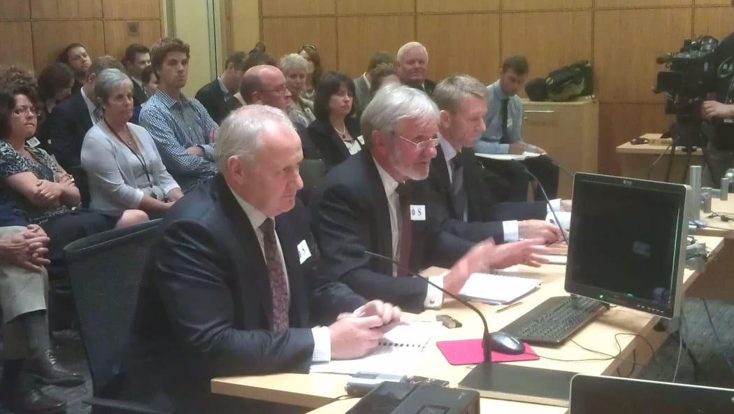 Solid Energy chairman Mark Ford, centre, with acting chief executive Garry Diack, left at the select committee.