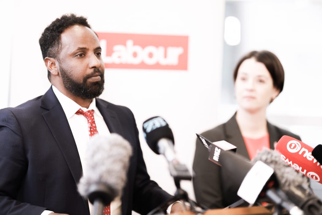 Ibrahim Omer, at podium.