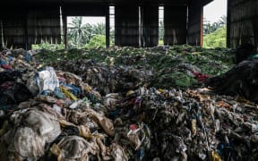 Plastic waste at an abandoned factory outside Kuala Lumpur.