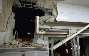 Syria's state media released images of what they say are destroyed houses near Damascus.