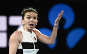 Romania's Simona Halep reacts after a point against Sofia Kenin of the US on day four of the Australian Open tennis tournament in Melbourne on January 17, 2019.