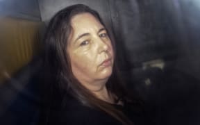 Erin Patterson arriving in the back of a prison transport vehicle at Latrobe Valley Magistrate's Court in Morwell, Australia.