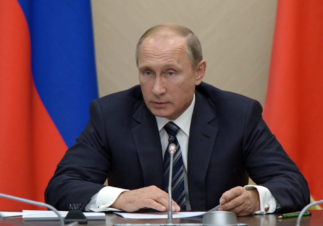 Russia's President Vladimir Putin chairs a meeting with members of the government at the Novo-Ogaryovo residence outside Moscow yesterday.