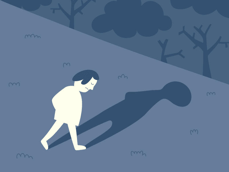A blue and grey illustration of a person walking alone and casting a shadow.