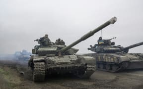 Ukrainian army tank units drive towards Kherson's frontline on the way to Kherson on 18 November, 2022.