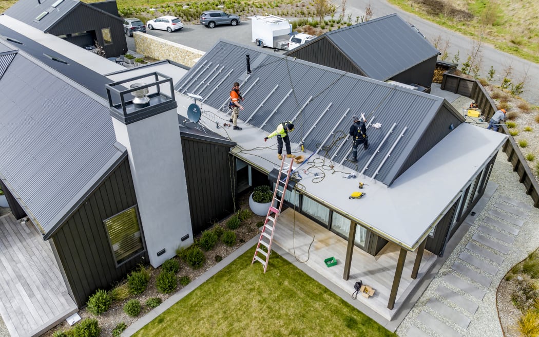 SolarZero workers installing panels