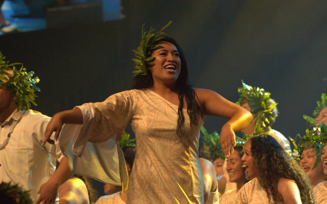 Upokotea Ruaporo of Oire Te Whanganui-a-tara gets up to dance mid ute performance.