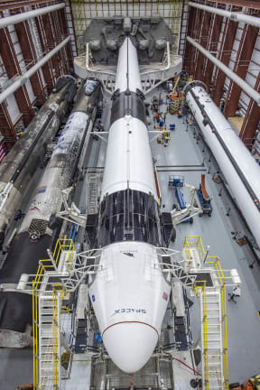 In this image released by Space X, the Crew Dragon spacecraft and the SpaceX Falcon 9 rocket are pictured at Launch Complex 39A on May 21, 2020, as preparations continue for the Demo-2 mission at NASA's Kennedy Space Center in Florida.