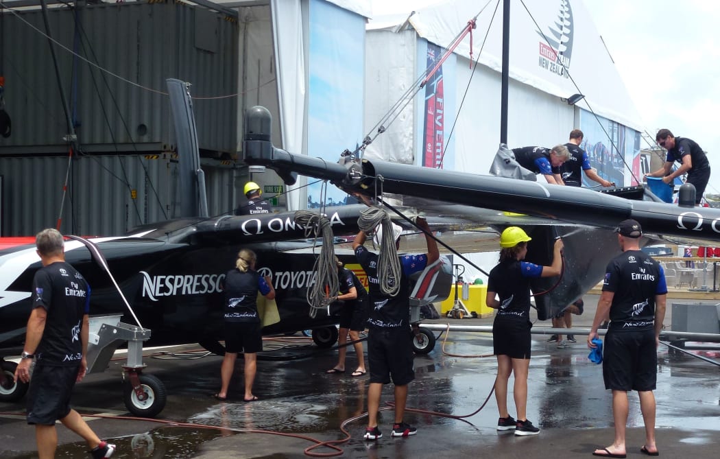 The Team New Zealand boat being washed and put away ahead of tomorrow's racing.