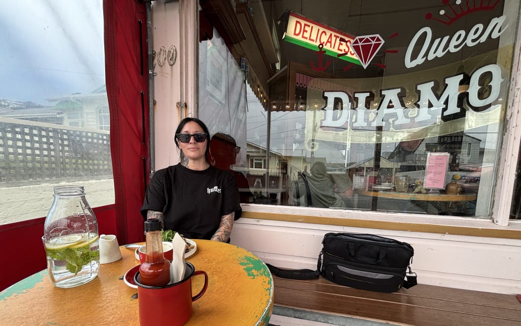 Emma Dee says the sight of the recent damage to the Queens Drive building made her “hands shake” after her own home was struck by airborne roofing iron during recent storms.