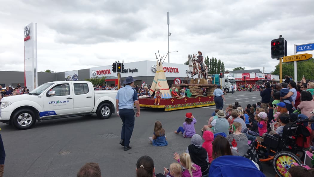 The Ojibwe costumes were removed from the float after complaints, but the cowboys and horses remained.