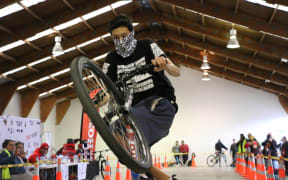 Isaiah, 15, says he couldn't miss the opportunity to compete in his neighbourhood with bike stunts.