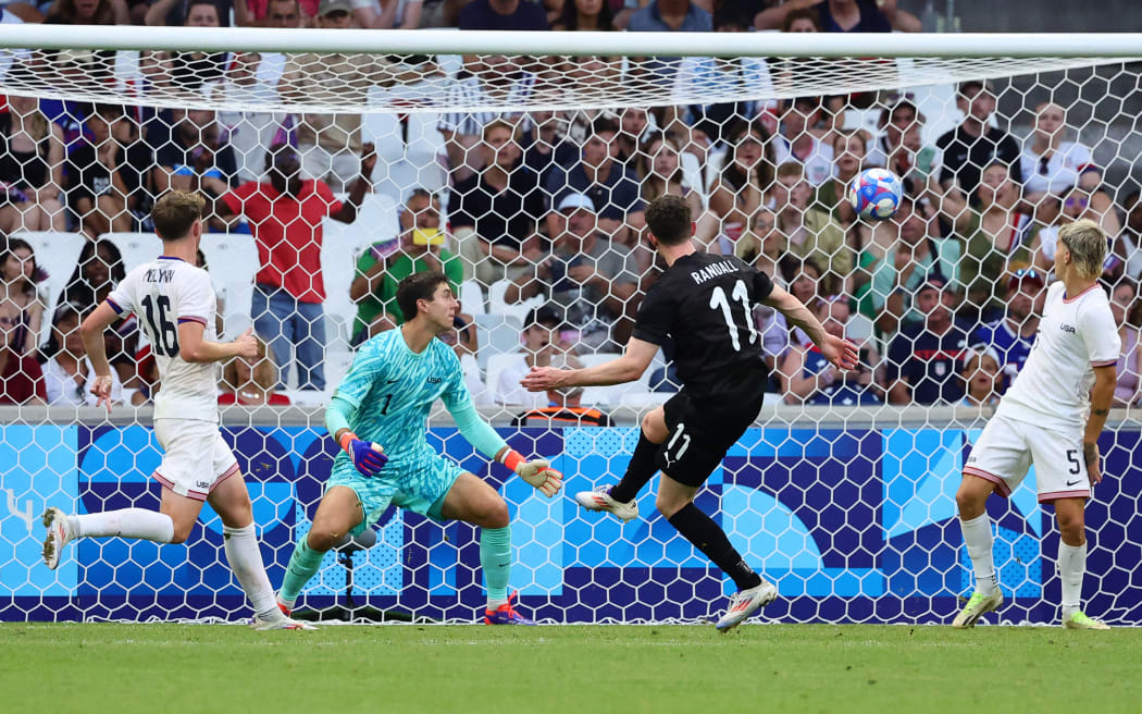 New Zealand's forward #11 Jesse Randall scores his team's goal in the men's group A football match between New Zealand and the USA during the Paris 2024 Olympic Games at the Marseille Stadium in Marseille on July 27, 2024.