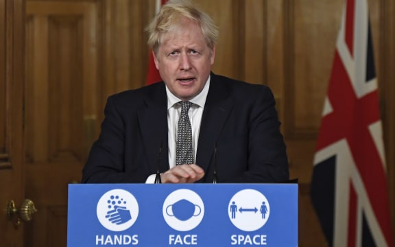 Britain's Prime Minister Boris Johnson speaks during a virtual press conference inside 10 Downing Street in central London on October 31, 2020 to announce new lockdown restrictions in an effort to curb rising infections of the novel coronavirus.