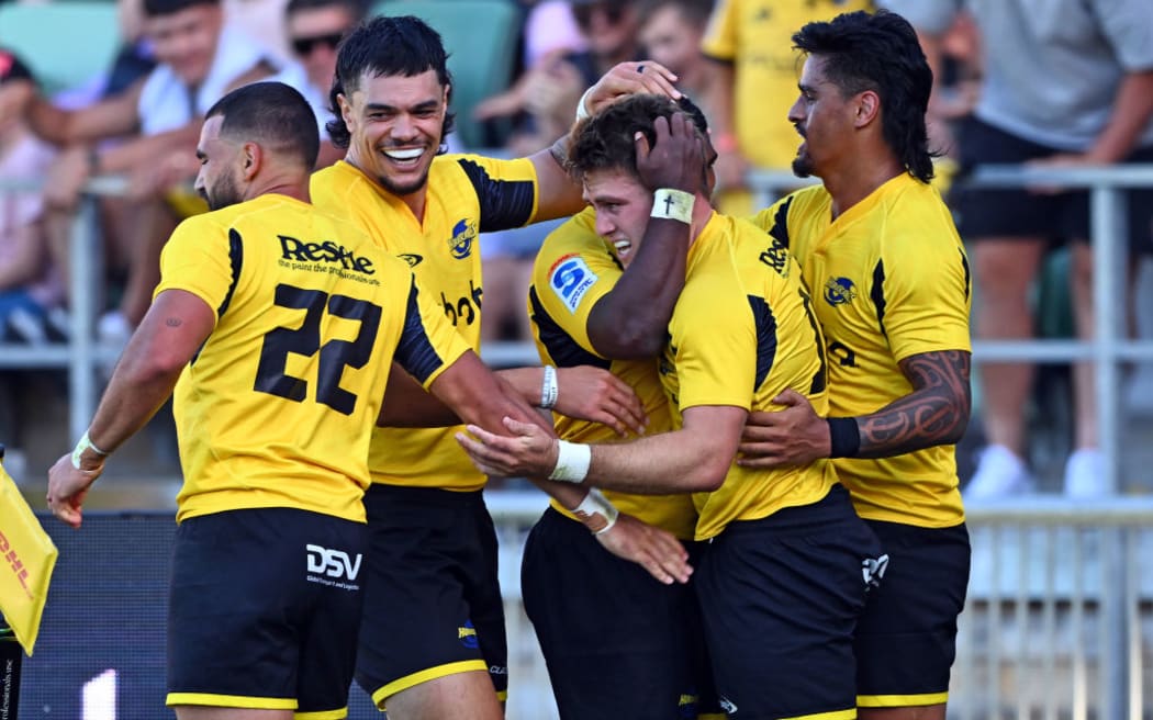 Hurricanes players celebrate a try during the round two Super Rugby Pacific match between Hurricanes and Fijian Drua at McLean Park.