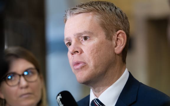 Prime Minister Chris Hipkins talks to journalists.