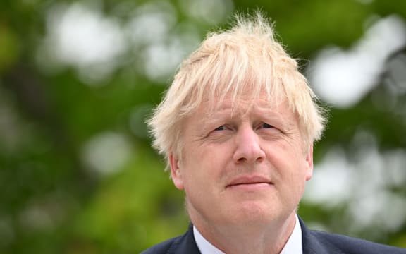 British Prime Minister Boris Johnson addresses a press conference with Sweden's Prime Minister after talks at the retreat residence of the Swedish Prime Minister in Harpsund 120km west of Stockholm, Sweden on May 11, 2022. - British Prime Minister Johnson and his Swedish counterpart Andersson on May 11, 2022 announced a mutual defence agreement in case of an attack, as Sweden considers whether to join NATO. (Photo by Jonathan NACKSTRAND / AFP)
