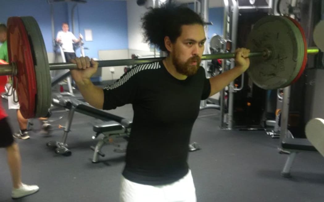 Tongan skier Kasete Skeen hits the gym.