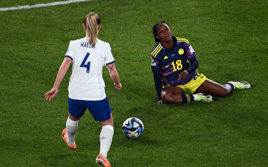 Colombia's Linda Caicedo (R) reacts to an injury as England' Keira Walsh looks on during the FIFA Women's Football World Cup quater-final.